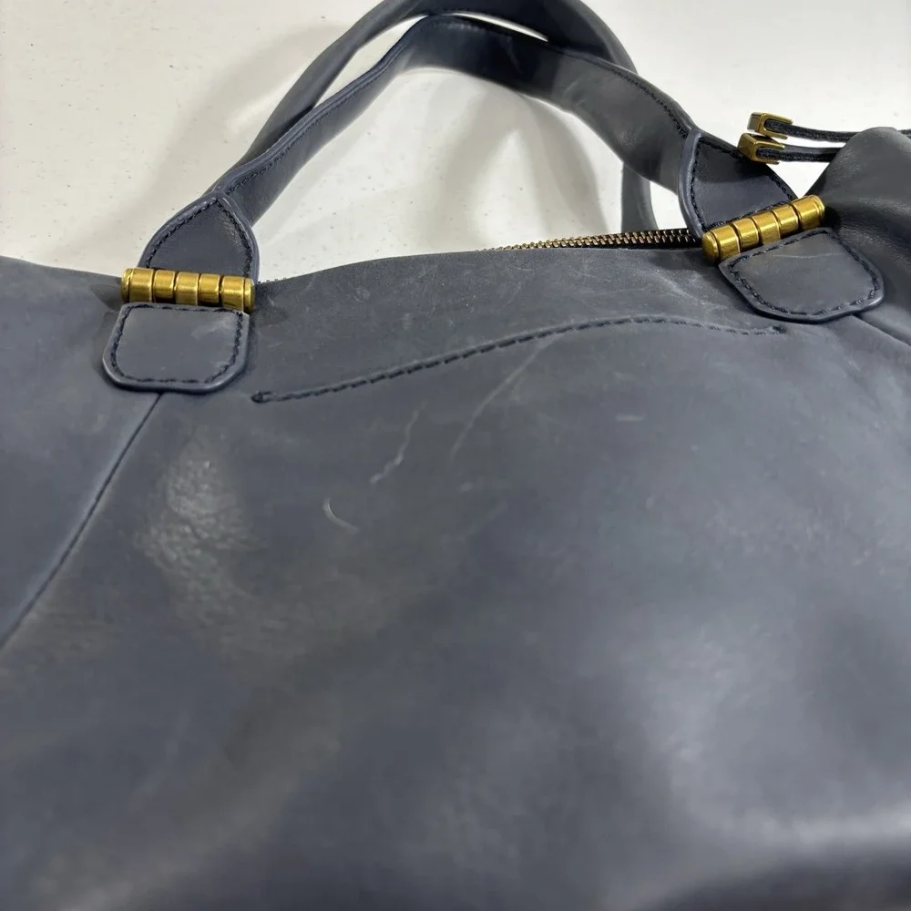 The Sak Serena Leather Handbag Navy Blue Tobacco Souk Floral Embossed